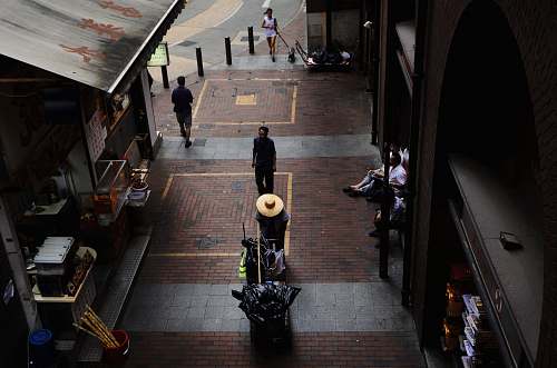 walking man standing near building bench